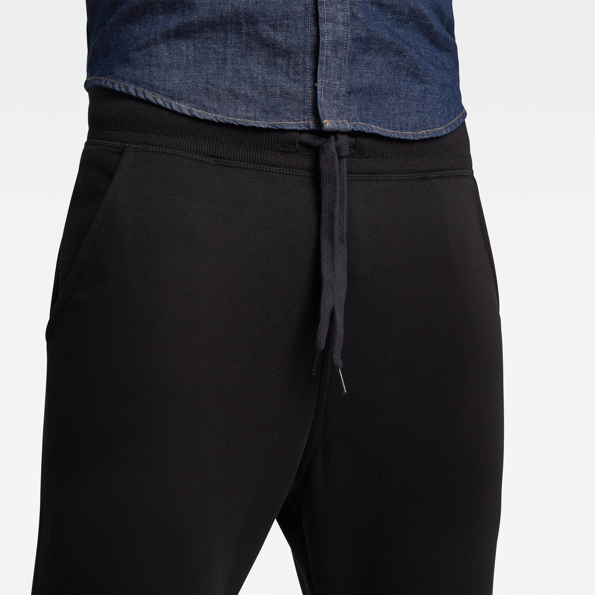 Men’s Sustainably Made Cotton Black Tracksuit Bottom Joggers with a cuffed hem from G-Star RAW available at StylishGuy Menswear Dublin