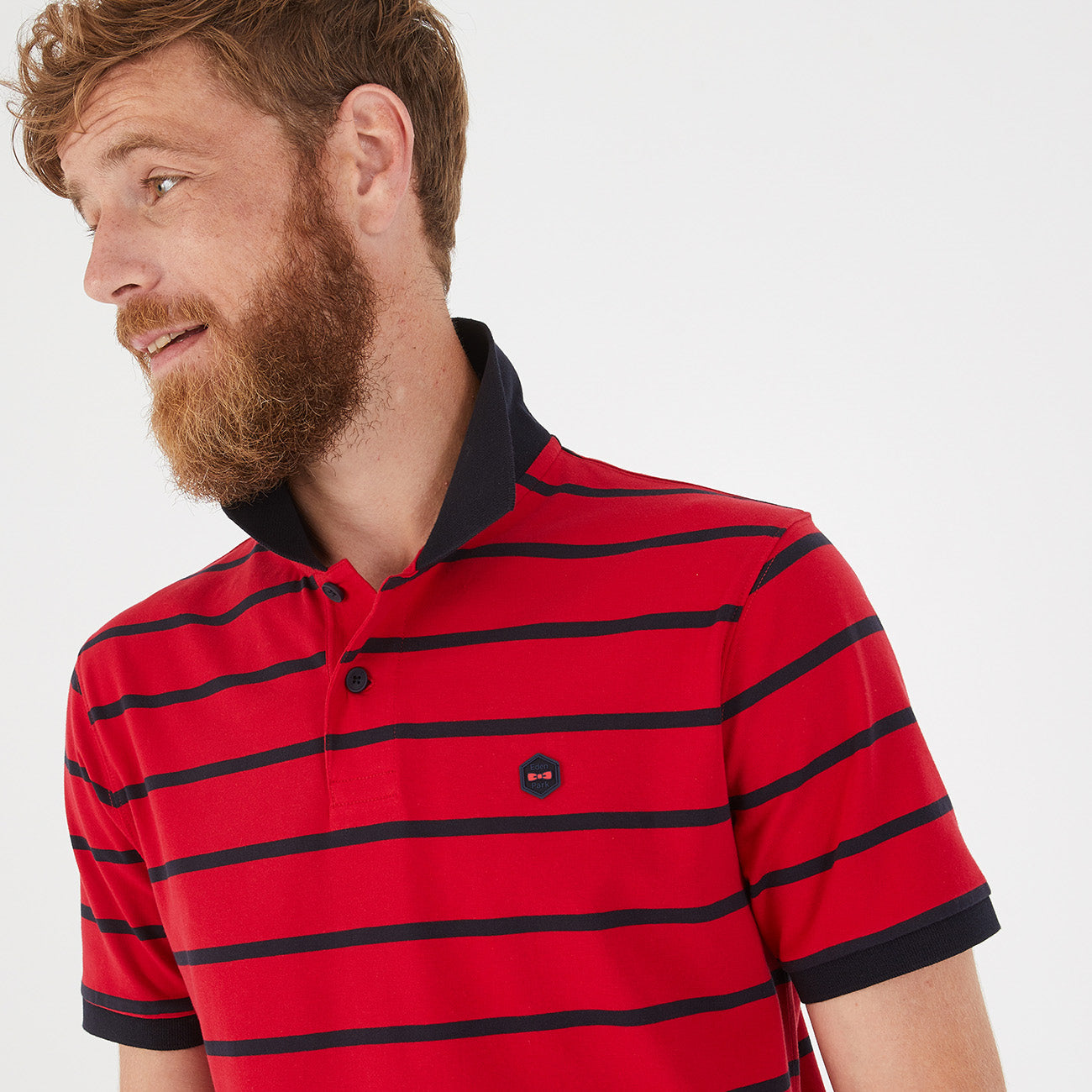 red white and black striped polo shirt